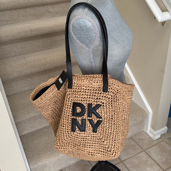 - New DKNY Paloma Tote. Nice large bag with DKNY letters on the front. - Picture 10 of 15